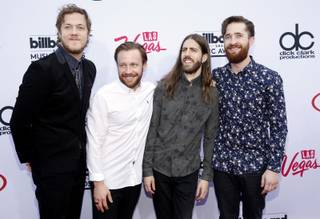 Dan Reynolds, from left, Ben McKee, Daniel Sermon, and Daniel Platzman of the musical group Imagine Dragons arrive at the Billboard Music Awards at the MGM Grand Garden Arena on Sunday, May 17, 2015, in Las Vegas. (Photo by Eric Jamison/Invision/AP)