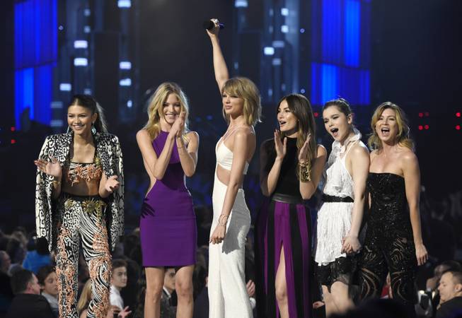 From left, Zendaya, Martha Hunt, Taylor Swift, Lily Aldridge, Hailee Steinfeld and Ellen Pompeo speak at at the Billboard Music Awards at MGM Grand Garden Arena on Sunday, May 17, 2015, in Las Vegas.