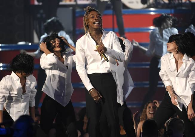 Wiz Khalifa performs at the Billboard Music Awards at MGM Grand Garden Arena on Sunday, May 17, 2015, in Las Vegas.
