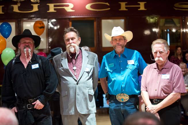 Contestants take part in the Whiskerino Contest, a facial hair competition during the Las Vegas Elk's Helldorado Days, Sat May 16, 2015.