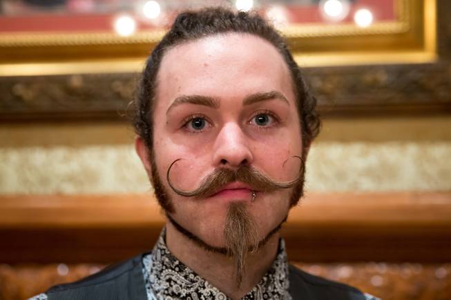 First time competitor Jarrett Runnells poses for a portrait at the Whiskerino Contest, a facial hair competition during the Las Vegas Elk's Helldorado Days, Sat May 16, 2015.