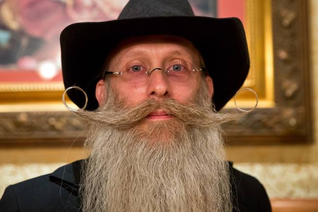 Aarne Bielefeldt poses for a portrait after winning Best Mustache at the Whiskerino Contest, a facial hair competition during the Las Vegas Elk's Helldorado Days, Sat May 16, 2015.
