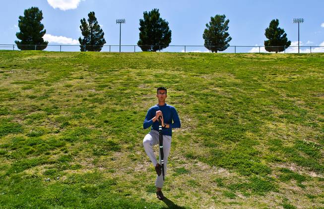 Palo Verde ROTC cadet Karim Hussein practices rifle drills with other members at the high school on May 19, 2015. He saved his dad from drowning in a freak accident in March and was awarded the ROTC"s highest honor May 13, 2015.