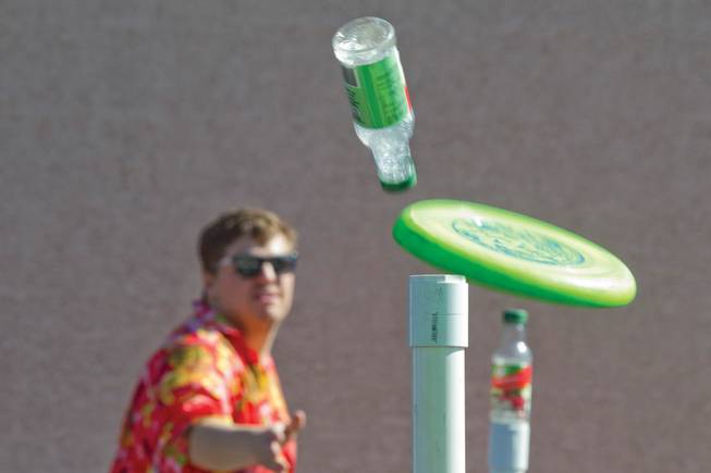 In the game of beersbee, when a player hits the bottle directly with the Frisbee, some rules give an extra point for knocking off the bottle directly instead of hitting the pole, though that’s not the most common way to play.