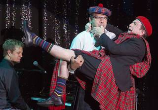 Las Vegas Sun columnist John Katsilometes,plays comedian Martin Short like a set of bagpipes during Short's show at the Mirage Friday, May 22, 2015. The performance was part of the Mirage's Aces of Comedy series.
