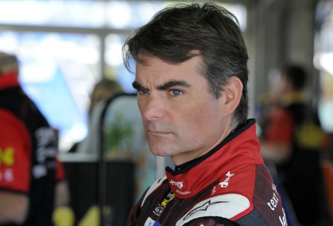 Jeff Gordon looks from the garage before practice for Sunday's NASCAR Coca-Cola 600 Sprint Cup series auto race at Charlotte Motor Speedway in Concord, N.C., on Saturday, May 23, 2015.