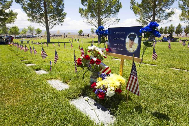 The gravesite of John Lukac is shown on Memorial Day at the Southern Nevada Veterans Memorial Cemetery in Boulder City Monday, May 24, 2015. Lukac, 19, a Durango High School graduate, died during Operation Iraqi Freedom in 2004.