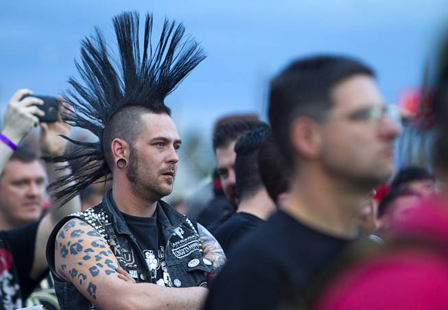 Fans listen to a band during the 17th annual Punk Rock Bowling & Music Festival in downtown Las Vegas Sunday, May 24, 2015.