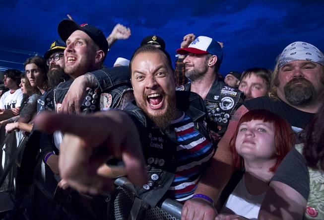 A fan strikes a pose while waiting for Murder City Devils during the 17th annual Punk Rock Bowling & Music Festival in downtown Las Vegas Sunday, May 24, 2015.