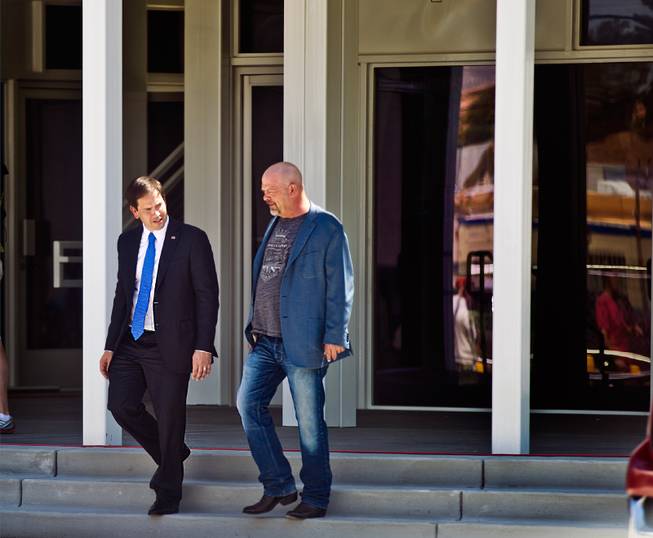 GOP Presidential candidate Marco Rubio talks with Rick Harrison of the World Famous Gold & Silver Pawn Shop as he tours a new shop being constructed during his first visit here as declared candidate on Thursday, May 28, 2015.
