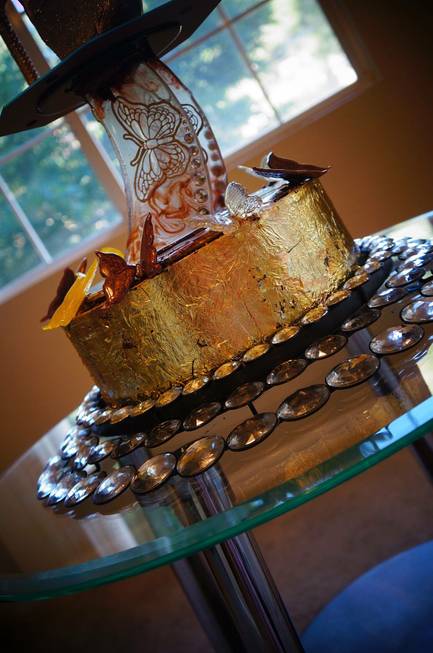 A gold cake created by Kailava of Las Vegas for ...