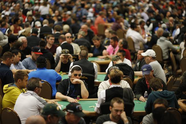 Crowds fill the tables during the World Series of Poker Colossus event Friday, May 29, 2015, in Las Vegas. Thousands of people entered the event with a relatively inexpensive $565 buy-in.