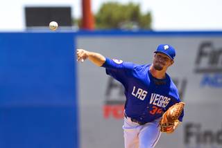 Las Vegas 51's Logan Verrett pitches as the 51's play against the Reno Aces at Cashman Field Sunday, June 14, 2015.