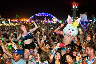 The crowd gets moving to Benny Benassi at Kinetic Field on the first night of the 2015 Electric Daisy Carnival on Friday, June 19, 2015, at Las Vegas Speedway.