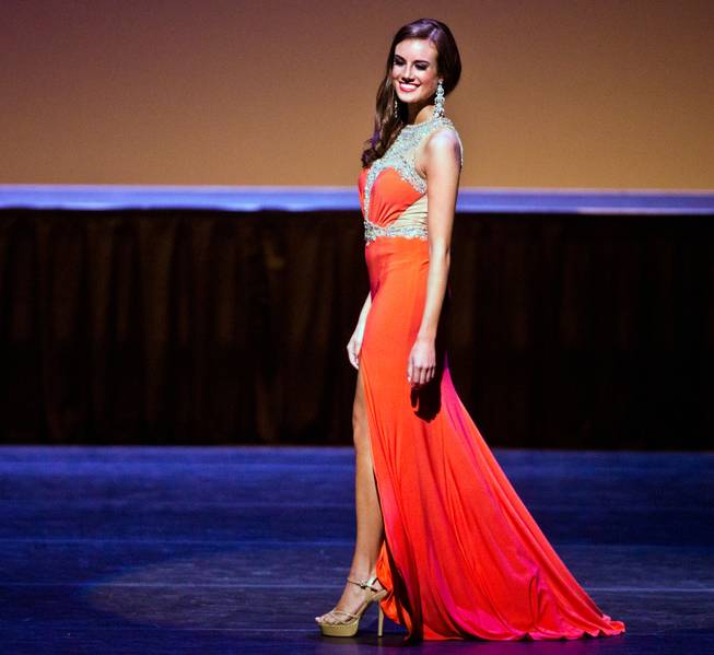 Miss Summerlin Katherine Kelley strolls along the stage in evening gown during the Miss Nevada Pageant and crowning at the Smith Center on Saturday, June 27, 2015.  She will go on to win the title later in the evening.