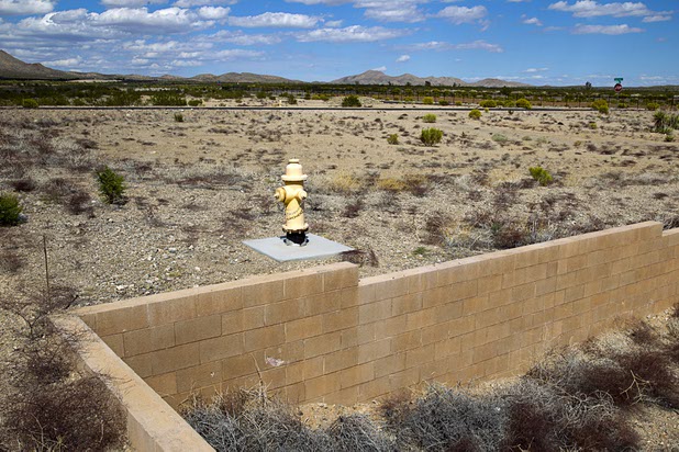 A fire hydrant is shown at the abandoned Airpark residential development near the Searchlight Airport in Searchlight on Sunday, Sept. 28, 2014.