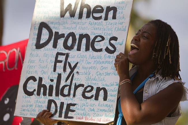 Anti-drone activist Vera Anderson of Las Vegas protests in front of the Clark County Regional Justice Center in Las Vegas Tuesday, June 30, 2015. Many of the activists taking part in the demonstration are facing misdemeanor charges in relation to a March 6, 2015 protest at Creech Air Force Base, about 45 miles northwest of Las Vegas.