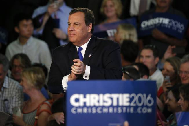 New Jersey Gov. Chris Christie arrives to speak to supporters during an event announcing he will seek the Republican nomination for president, Tuesday, June 30, 2015, at Livingston High School in Livingston, N.J.