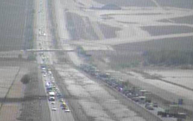 A photo from a traffic camera shows cars and trucks backed up on Interstate 15 near Primm after a truck packed full of fireworks caught fire Thursday, July 2, 2015.