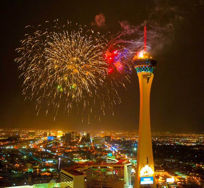 Fireworks illuminate the sky near the Stratosphere in Las Vegas.