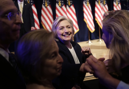 Democratic presidential candidate Hillary Clinton criticized her Republican challengers and called to raise the minimum wage during a major economic speech on Monday ...