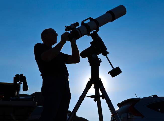 Las Vegas Astronomical Society member Rob Lambert sets up his telescope as he prepares to instruct  Boy Scouts at their camp on Mt. Potosi on Tuesday, June 23, 2015.