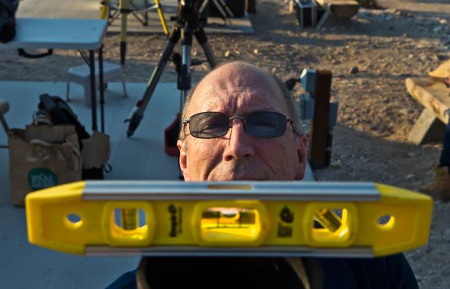Las Vegas Astronomical Society member Rob Lambert levels a tripod for his telescope as he prepares to instruct  Boy Scouts at their camp on Mt. Potosi on Tuesday, June 23, 2015.