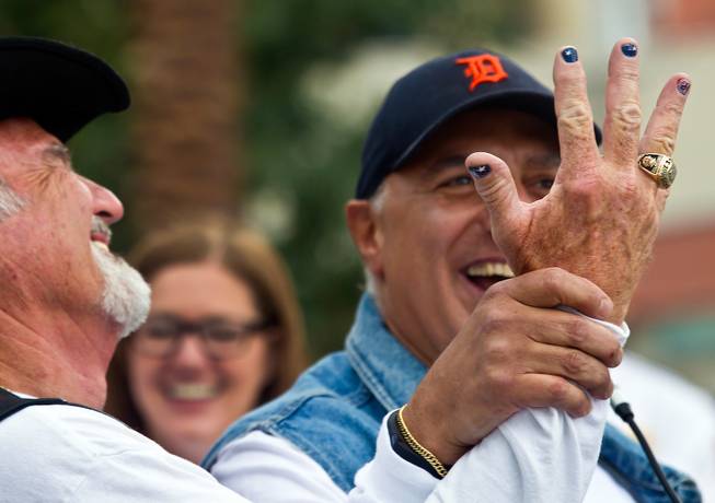 Nation of Patriots Southwest Regional Commander Larry Kusler has his painted nails shown off by Councilman Stavros S. Anthony during the 2015 Patriot Tour stop at Las Vegas City Hall with over 50 motorcycles along on Monday, July 20, 2015. Kusler lost a bet on fundraising and had to have his fingernails painted.