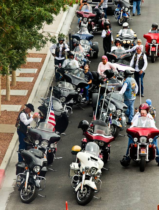 Members of the 2015 Patriot Tour ready to depart Las Vegas City Hall with over 50 motorcycles along heading to their next stop on Monday, July 20, 2015.