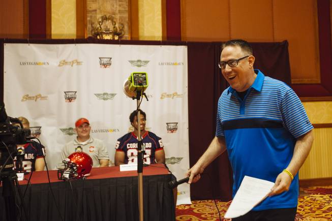 Las Vegas Sun Sports Editor Ray Brewer interviews Coronado High's Landen Rowland (left), coach Bill Froman, and Donovan Outlaw during the Las Vegas Sun's high school football media day at the South Point on July 22, 2015.