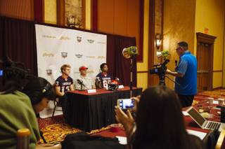 Las Vegas Sun Sports Editor Ray Brewer interviews Coronado High's Landen Rowland (left), coach Bill Froman, and Donovan Outlaw during the Las Vegas Sun's high school football media day at the South Point on July 22, 2015.