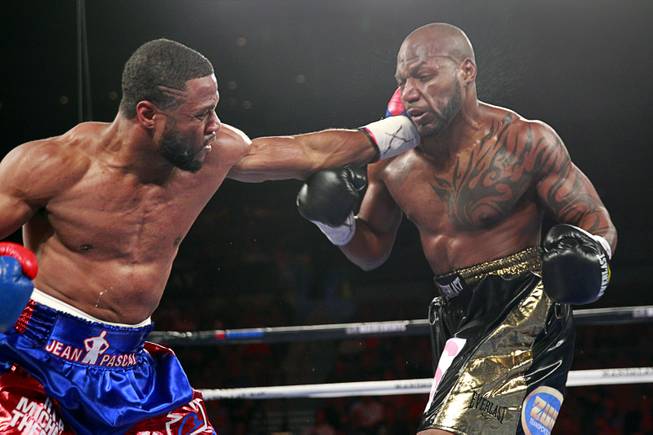 Jean Pascal, left, of Canada punches Yunieski Gonzalez of Cuba during their light heavyweight fight at the Mandalay Bay Events Center Saturday, July 25, 2015.