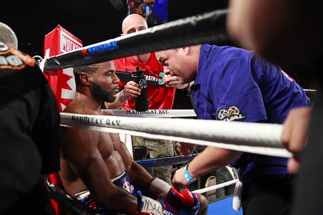 Jean Pascal of Canada listens to his trainer between rounds during his light heavyweight fight against Yunieski Gonzalez of Cuba at the Mandalay Bay Events Center Saturday, July 25, 2015.