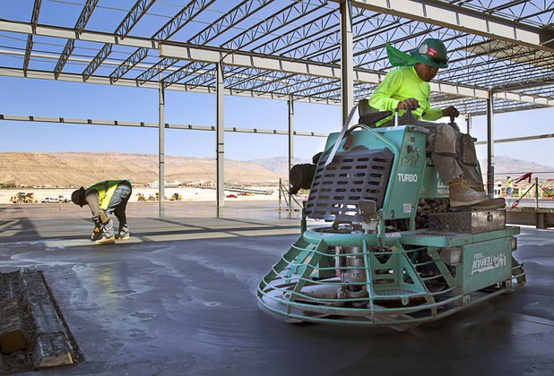 Alejandro Garcia operates a concrete finisher as construction continues on the Ikea Las Vegas store at Durango Drive and Sunset Road Tuesday, July 28, 2015. The store is expected to open in the summer of 2016.