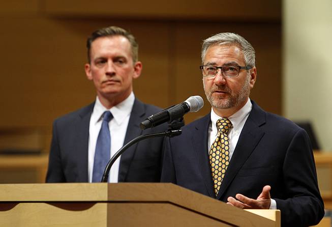 Tod Story, left, Nevada ACLU executive director, looks on  as Fremont Street Experience President Jeff Victor speaks during a news conference at Las Vegas City Hall Wednesday, July 29, 2015. The city unveiled a proposed ordinance that would regulate street performers at the Fremont Street Experience in downtown Las Vegas.