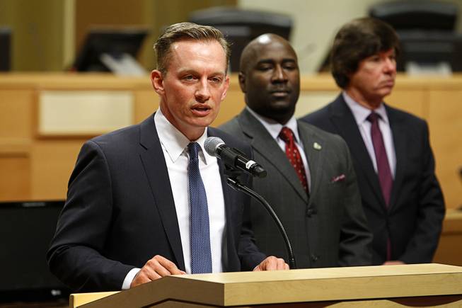 Tod Story, left, Nevada ACLU executive director, speaks during a news conference as City Councilman Ricki Barlow, center, and City Attorney Brad Jerbic listen at Las Vegas City Hall Wednesday, July 29, 2015. The city unveiled a proposed ordinance that would regulate street performers at the Fremont Street Experience in downtown Las Vegas.