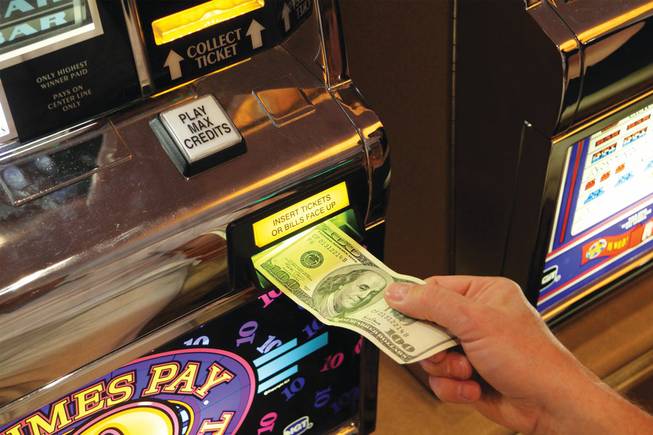stock photo of cash bill insert slot machine casino 