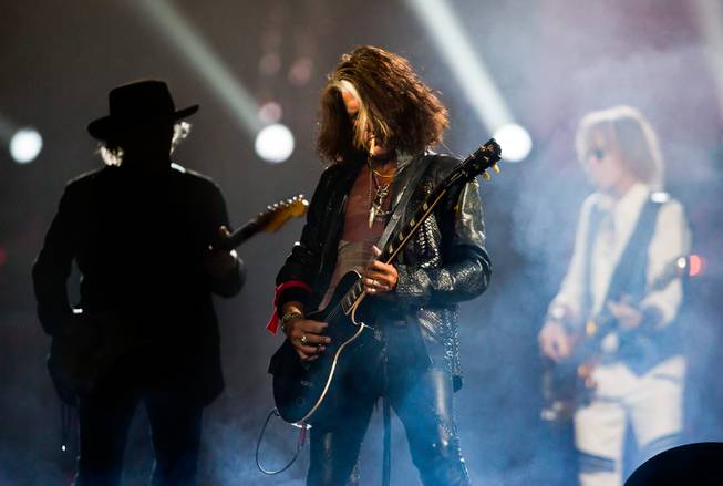 Aerosmith lead guitarist Joe Perry performs with the band Saturday, Aug. 1, 2015, at MGM Grand Garden Arena.