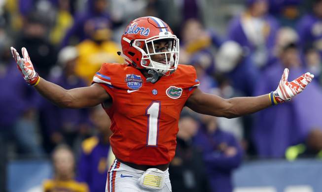 Florida defensive back Vernon Hargreaves (1) celebrates after he intercepted a pass to secure their 28-20 over East Caroline late in the second half of the Birmingham Bowl NCAA college football game, Saturday, Jan. 3, 2015, in Birmingham, Ala.