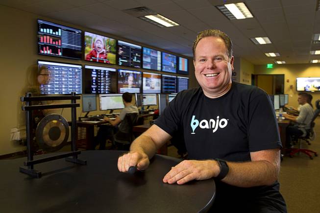 Banjo CEO Damien Patton poses in the company's event center Thursday, Aug. 6, 2015.