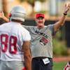 UNLV offensive coordinator Barney Cotton smiles at his players early in their first football team practice of the regular season on Friday, August 7, 2015. UNLV offensive coordinator Barney Cotton smiles at his players early in their first football team practice of the regular season on Friday, August 7, 2015.