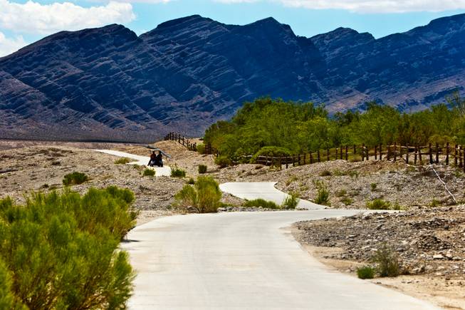Golfers must travel a long way from the clubhouse to the course at Coyote Springs Golf Club. 