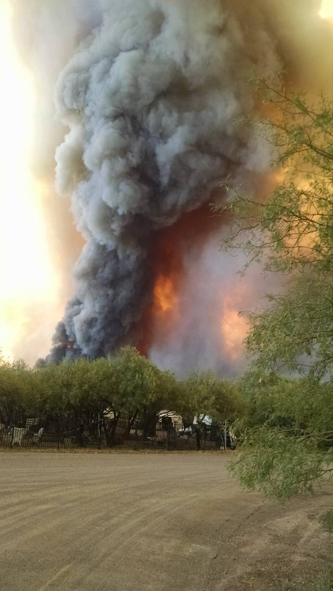 The Willow Fire is shown approaching Terry King’s property in Mohave Valley, Ariz. on Saturday. His home was one of the homes that was destroyed. 
