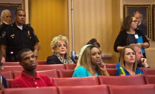 Mayor Caroline Goodman takes in the proceedings as Fremont Street Experience buskers and others attend an informational meeting at the city council chambers regarding a new ordinance which sets new standards for them during performances on Tuesday, August 11, 2015.