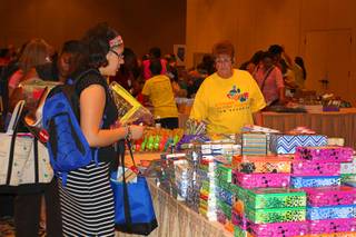 Teachers collect free school supplies during MGM Resorts' annual Educator Appreciation Day at the Mirage Thursday, Aug. 13, 2015. MGM Resorts employees distributed a ballroom full of donated items to Clark County School District teachers. Nonprofit agencies and CCSD's School-Community Partnership Program also participated in event.