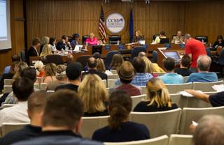 During the regular board meeting of the Clark County School District Board of Trustees members of the teacher's attend to speak about the pay freezes on Thursday, August 13, 2015.
