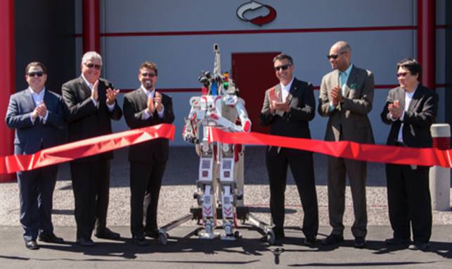 State Sen. Michael Roberson, Clark County Commissioner Steve Sisolak, Switch founder and CEO Rob Roy, UNLV’s Metal Rebel Robot, Gov. Brian Sandoval, state Sen. Aaron Ford and Paul Oh, director of UNLV’s autonomous systems labs, at the ribbon-cutting for the Supernap Las Vegas 9 data center on Thursday, Aug. 13, 2015.