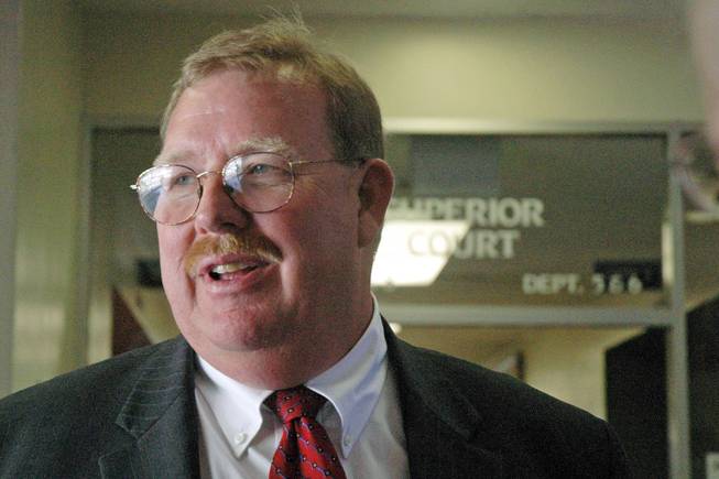 In this May 24, 2006 photo, attorney Frank Carson speaks at the Stanislaus County Courthouse in Modesto, Calif. He was arrested with authorities saying several suspects all played a role in killing 26-year-old Korey Kauffman, who was reported missing in April 2012. 
