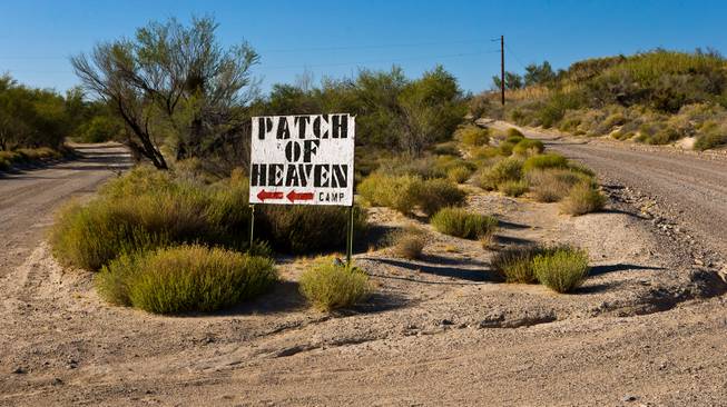 Sign directing visitors to the Patch of Heaven church camp in Pahrump owned by Pastor Victor Fuentes and wife Annette who are suing the U.S. Fish and Wildlife Service  after they diverted a stream that had once run through their land in order to save an endangered fish on Tuesday, July 28, 2015.