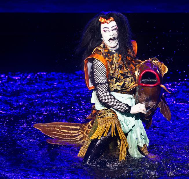 Kabuki actor Ichikawa Somegoro subdues a giant carp during the Kabuki masterpiece Koi Tsukami or Fight with a Carp about the Fountains of Bellagio on Saturday, August 15, 2015.